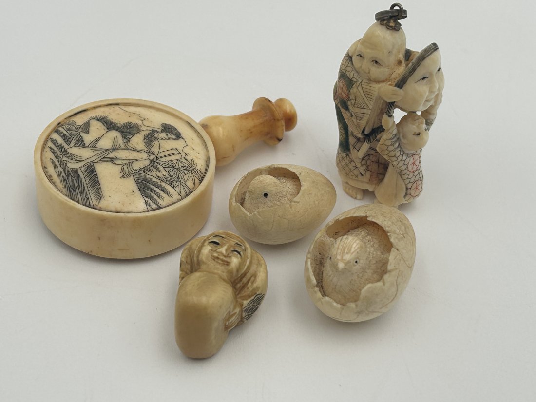 Antique Chinese and Japanese Curio Items, including netsukes and Snuff Bottle: Netsukes, a Pendant, and snuff bottle. Several are signed. The largest [snuff bottle] is 2.875" in height.