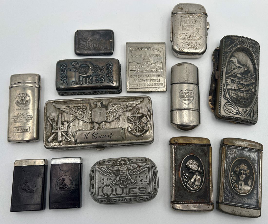 Large collection of antique Curio Items- vestas, shaver, tins, portable lantern and sharpening stone: A well-rounded grouping of antique items of interest. Includes: Scarce 1903 Pike's sharpening stone, match safes, Egyptian Revival tin, 1889 Magic Pocket Lantern, and named World War 1 grooming kit.