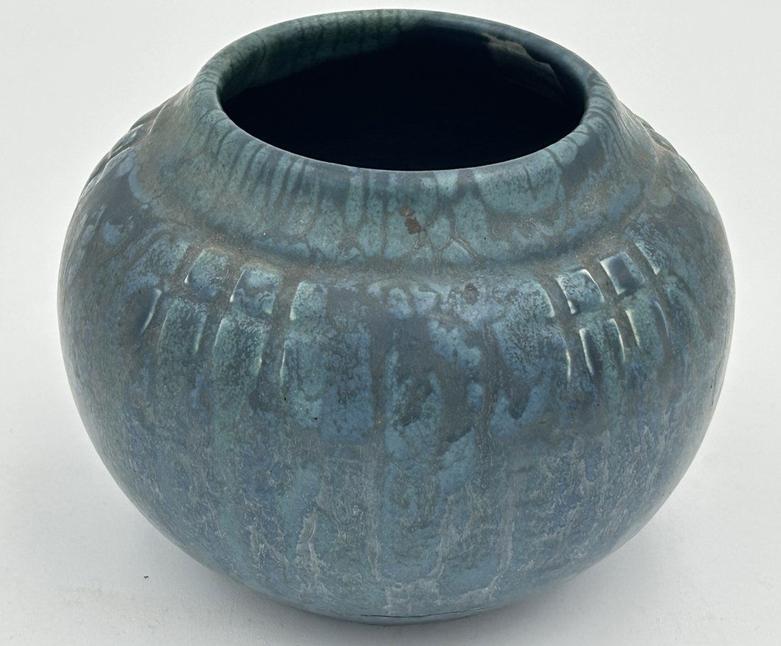 Circa 1910 Hampshire Pottery Arts & Crafts Matte Blue Vase: A squat form, with matte blue glaze and rare mosaic tile pattern. It is in very good condition, with impressed marks on the underside. Circa 1910.