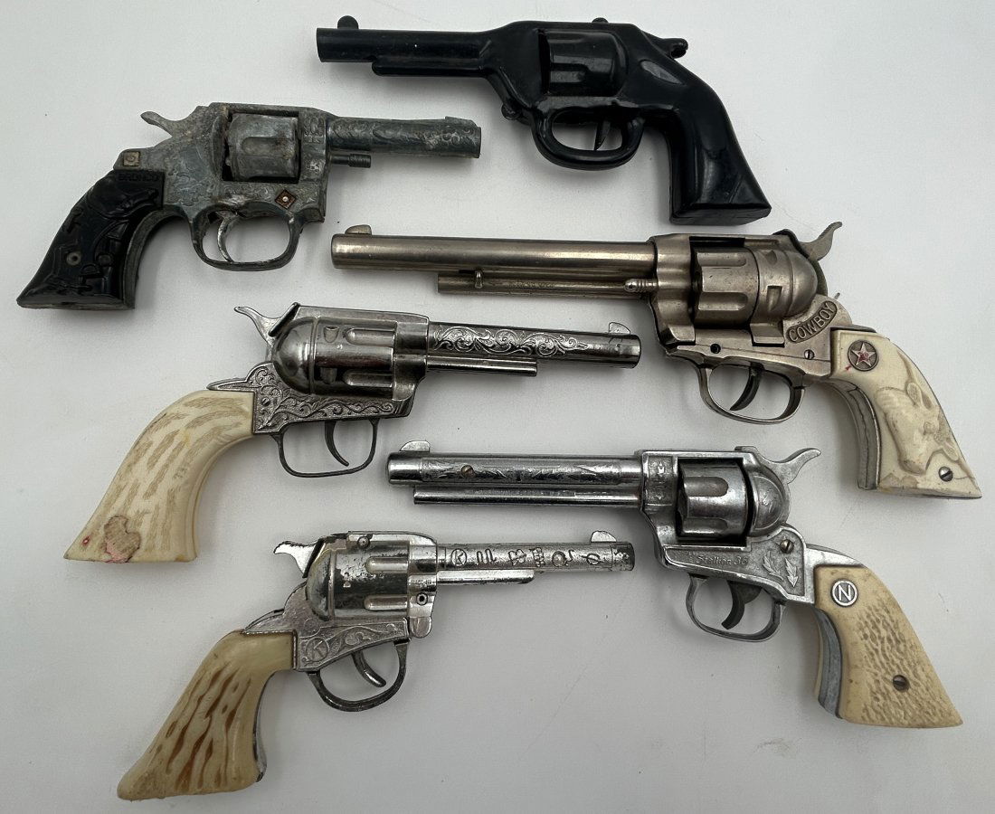 6 Vintage Cap Guns: A grouping of vintage cap gun revolvers, all in good condition. Larger examples, by makers such as Hubley