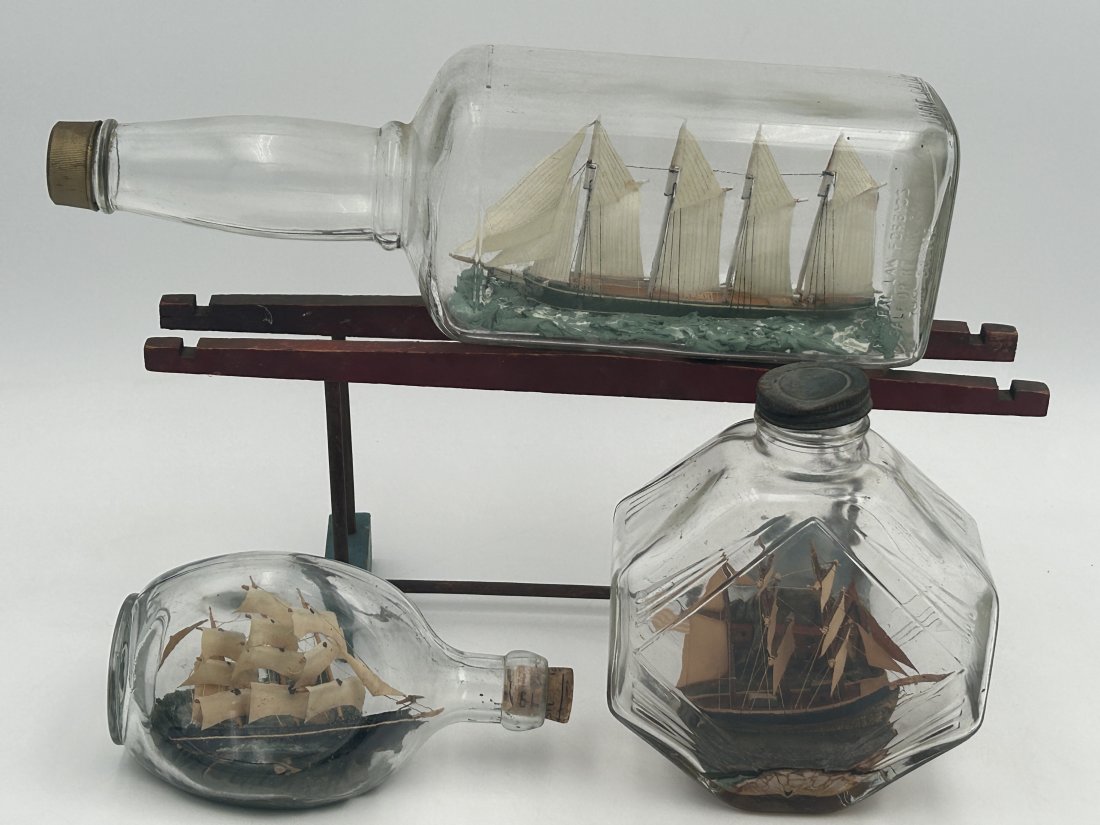 3 Vintage Ship in a Bottle Models: All are very fine examples, quite detailed, with frothing seas and masted clipper ships. Longest measures 14.25" in length.