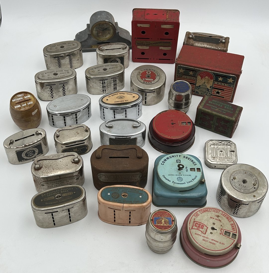 27 Vintage Dime Banks: A large grouping of vintage dime banks, popular between the 1930s and 1950s. Many are attributed to banks and lenders. Also several tin lithographed, and even a Bakelite example. 27 in total. Largest 