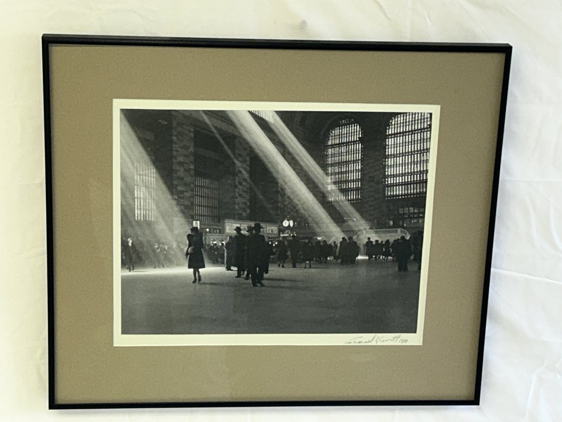 Signed 1939 Photograph of Sunlight Pouring into Grand Central Station: Signed by artist and dated 1939. Photo looks to be original and period correct, but not examined out of frame. An iconic subject- beams of sunlight pouring into Grand Central Station in Manhattan, New