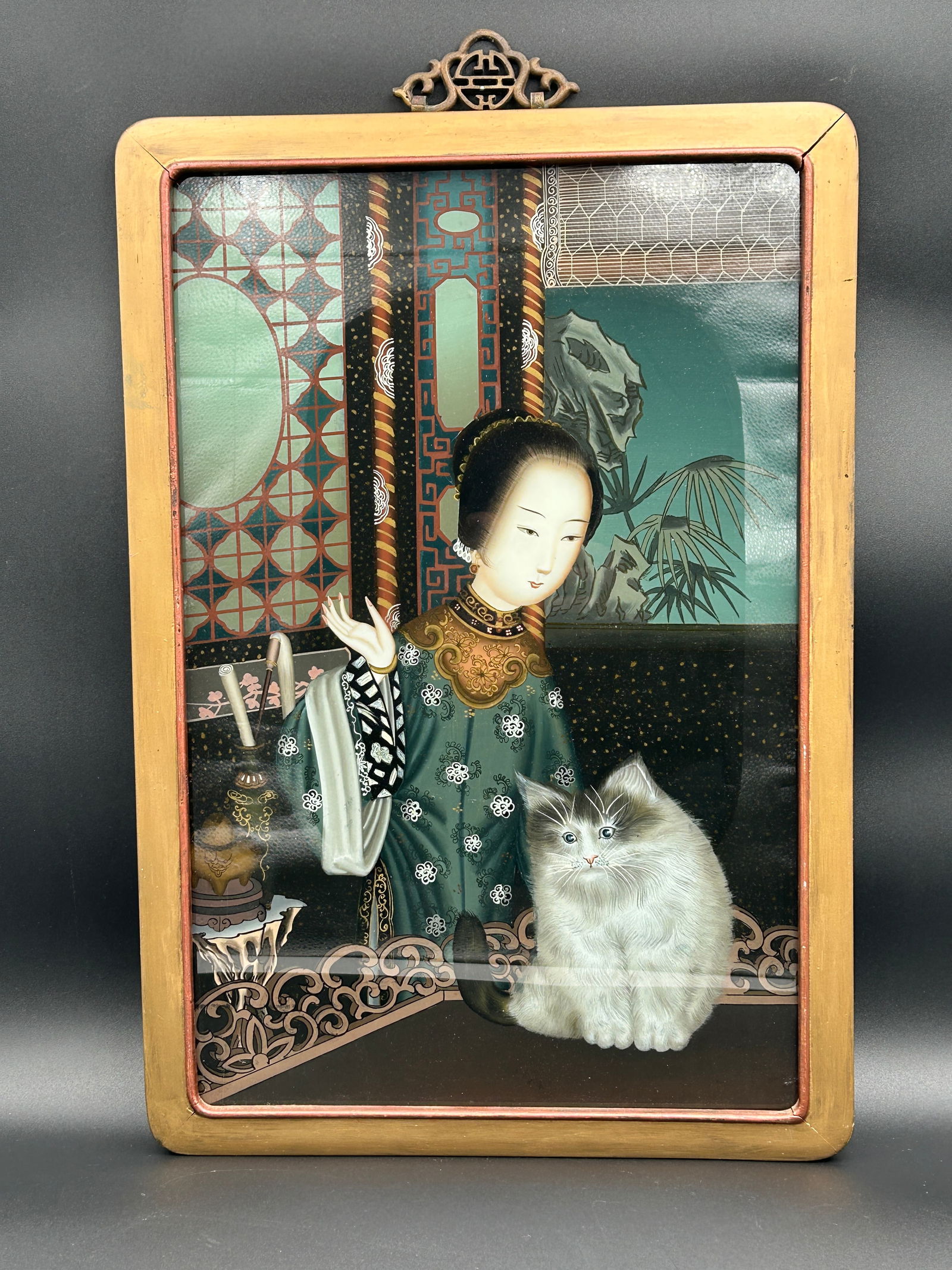 antique Chinese reverse painting on glass- woman of means and cat: Antique Chinese late Qing dynasty reverse painting of a woman of means with her feline companion. Housed in original frame. Circa 1890.