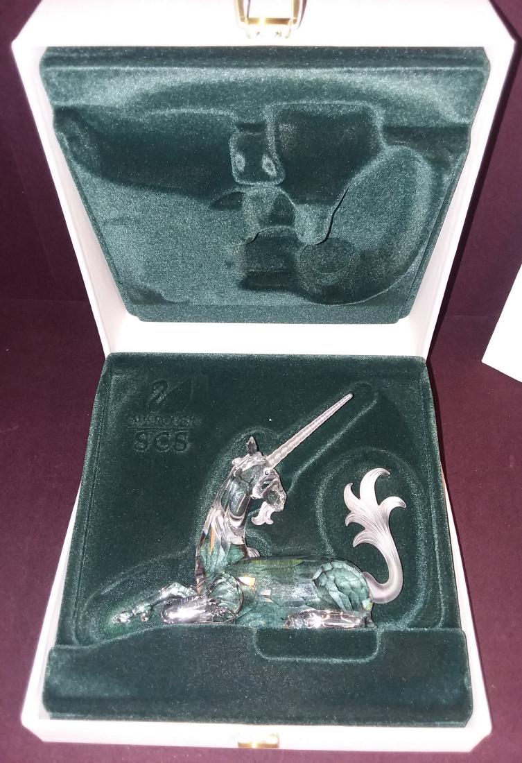 ANNUAL 1995 SVAROVSKI "FABULOUS CREATURES" UNICORN: Swarovski Crystal Limited Edition Annual Figurine Issued In 1996 / Retired In 1996 "UNICORN" Has Stamped Logo: Swan Figure Is Approx. Size: 4 1/4" High X 5 3/4" In box with COA. No visual damage to th