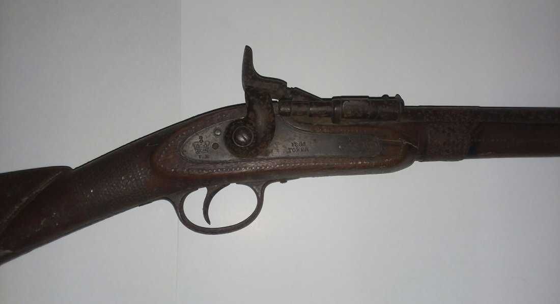 ANTIQUE CAVALRY RIFLE W/ ENGLISH PERCUSSION WORKS: Antique Cavalry Rifle, with English Percussion Works The extreme hardwood stock profusely inset with small brass pins used as various decorations, seemingly Islamic or Arabic, perhaps from North Afric