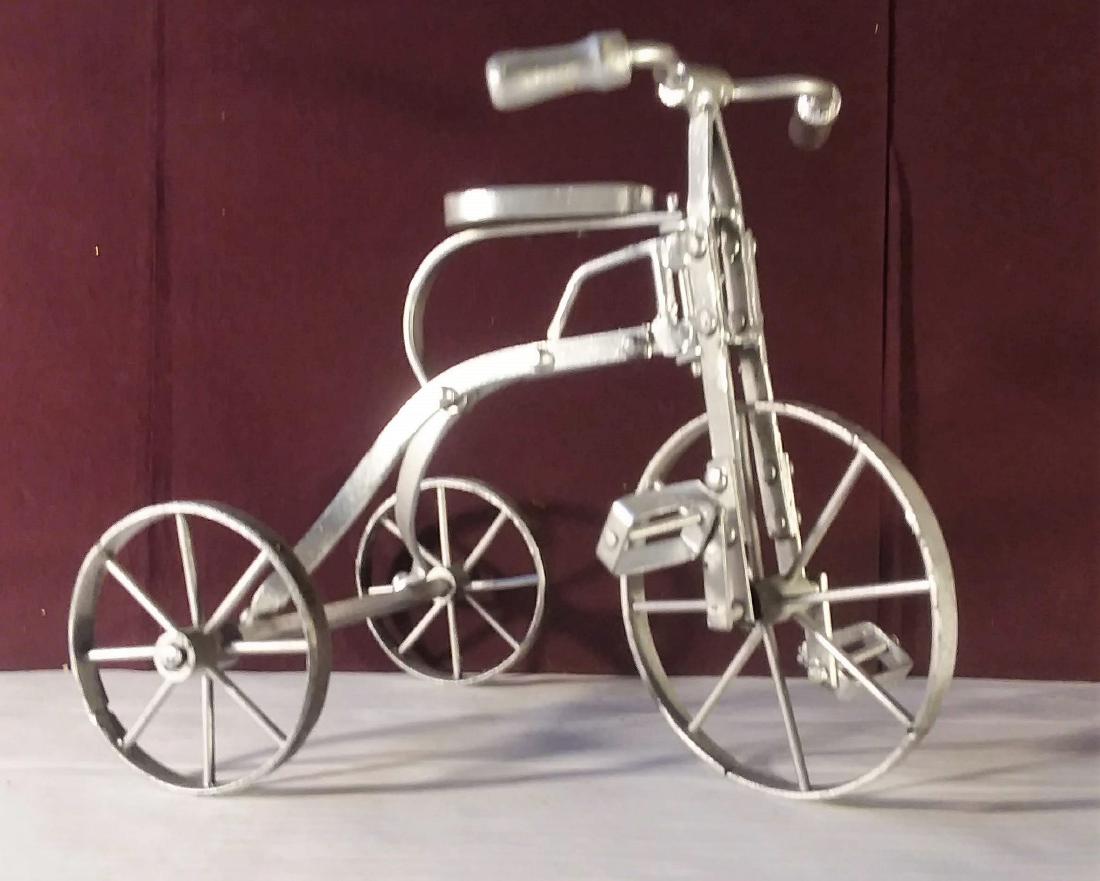HAND-CRAFTED MINIATURE STEEL TRICYCLE. (1 of 4)