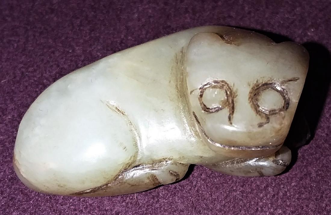 A Small Early Chinese White Jade Feline (1 of 3)