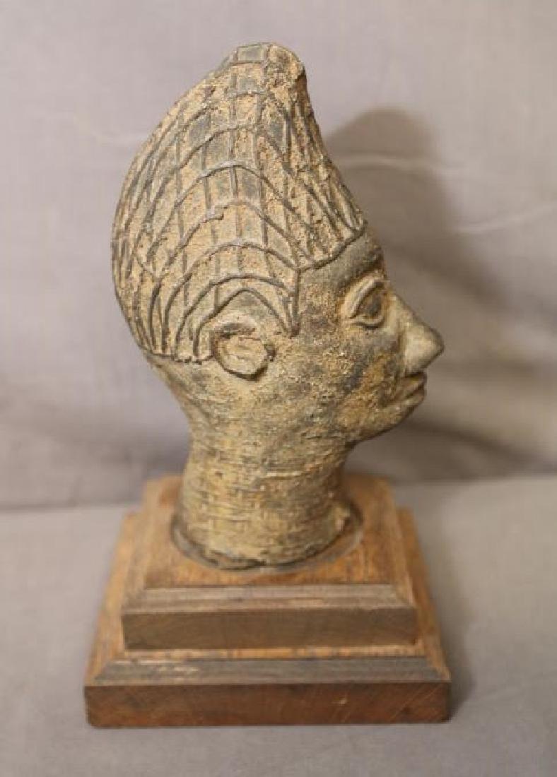 BUST OF QUEEN, YORUBA PEOPLE, BENIN: BUST OF QUEEN. Yoruba people, Benin. The Benin Kingdom was founded by the son of a Nigerian King around 1300. By the 15th century the people of Benin were noted for their skilled casting of brass obje