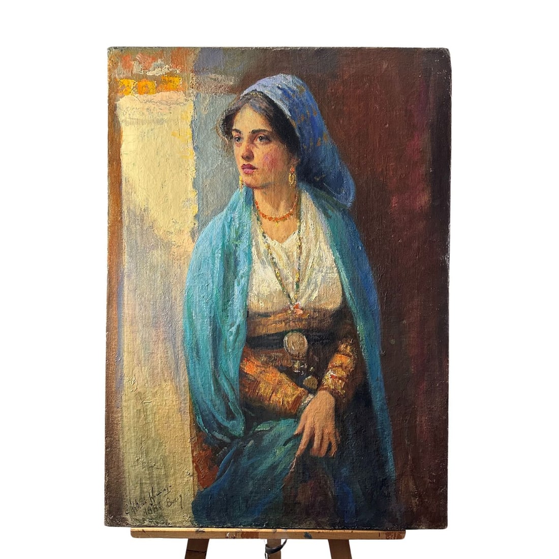 Woman covered with a blue scarf. (1 of 5)