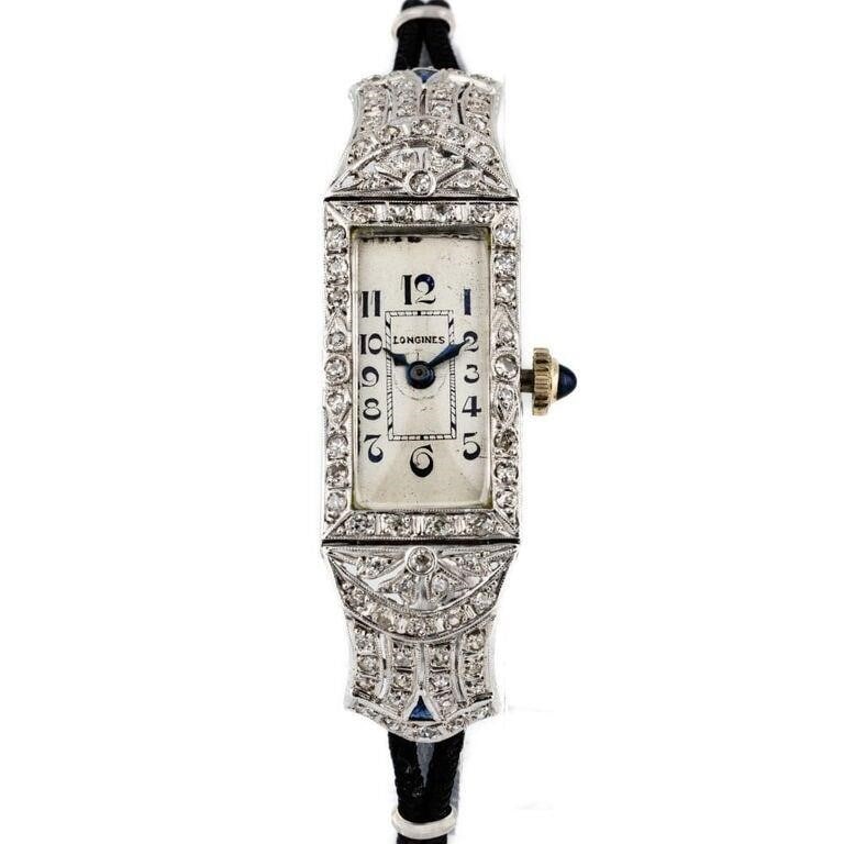 Antique Longines Platinum Art Deco Diamond & Sapphire Hooded Lugs Manual Wind Wrist Watch: A very fine, Antique Longines Platinum Art Deco Diamond & Sapphire Hooded Lugs Manual Wind Wrist Watch. The watch case was entirely hand crafted in Platinum set with single cut, antique diamonds a