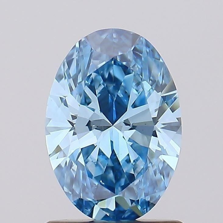 1.02 Carat Oval IGI VS2 Fancy Vivid Blue Diamond (1 of 6)