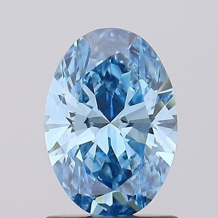 1.02 Carat Oval IGI VS2 Fancy Vivid Blue Diamond (1 of 6)