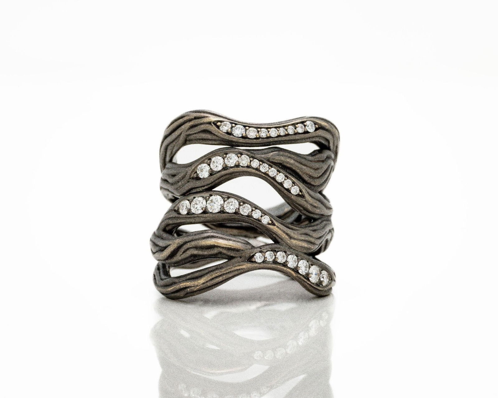 Antonini 18kt Black Gold Diamond Vulcano Ring: Antonini 18K Black Rhodium Gold Vulcano Ring - 0.50ctw E/VVS Natural Diamonds - Iconic Italian Design This exquisite Antonini Vulcano ring is a sculptural statement of modern elegance and Italian craf