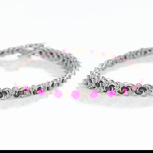 14k White Gold 5.5ct Diamond Ruby Tennis Bracelet: 14k White Gold Tennis Bracelet - 5.5ctw Natural Rubies & Diamonds - 7.5" - Estate Piece This elegant 14k white gold tennis bracelet features a striking alternating pattern of vibrant pinkish-red natur