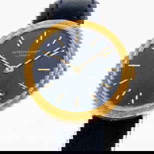 Vintage 18KT Yellow Gold Patek Philippe Calatrava: Vintage Patek Philippe Calatrava - Blue Dial - 25mm - Sapphire Crystal - 18kt Gold A refined and timeless vintage Patek Philippe Calatrava wristwatch featuring a 25mm round 18kt yellow gold case, eleg