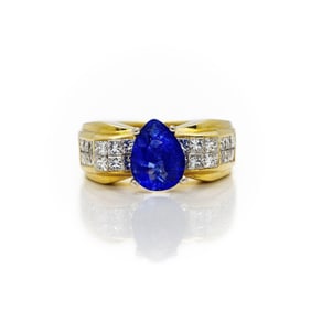 18kt Gold Tanzanite Invisible Set VS Diamond Ring