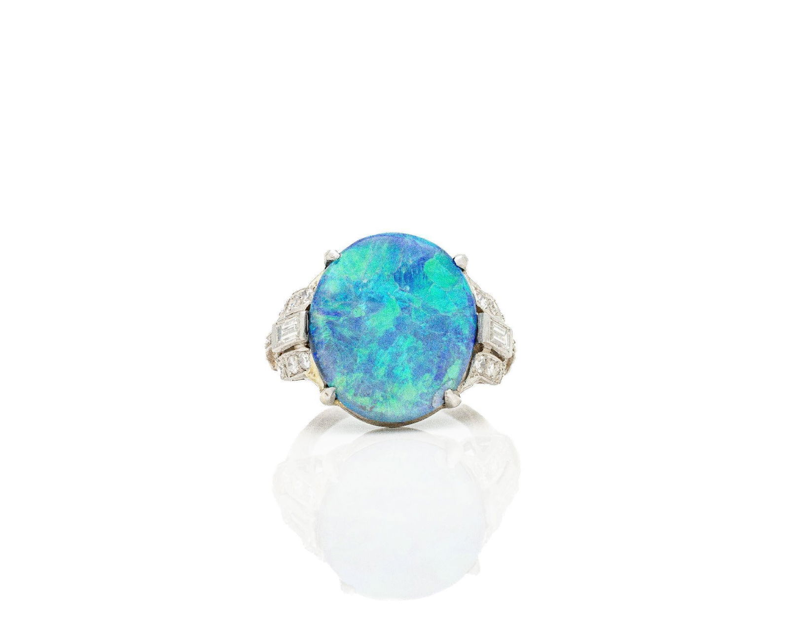 Antique J.E. Caldwell 18kt Gold Opal Diamond Ring: J.E. Caldwell Art Deco Opal & Diamond Ring A signed Art Deco masterpiece by J.E. Caldwell, crafted in solid 18kt white gold and centered around a mesmerizing natural opal measuring approximately 19.5m