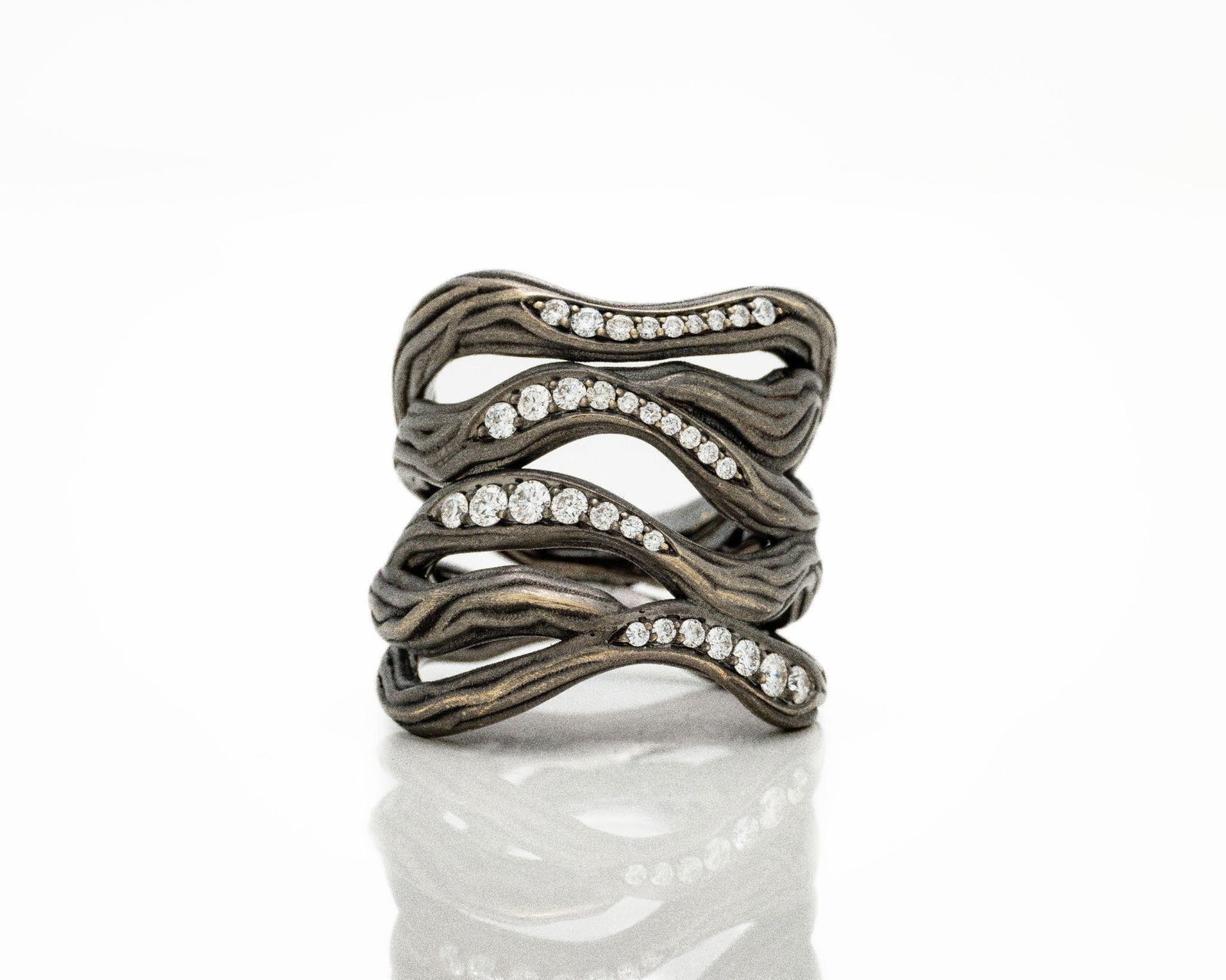 Antonini 18kt Black Gold Diamond Vulcano Ring: Antonini 18K Black Rhodium Gold Vulcano Ring - 0.50 ctw E/VVS Diamonds - Iconic Italian Design An exceptional designer creation from Antonini of Milan, this Vulcano ring exemplifies modern Italian lux