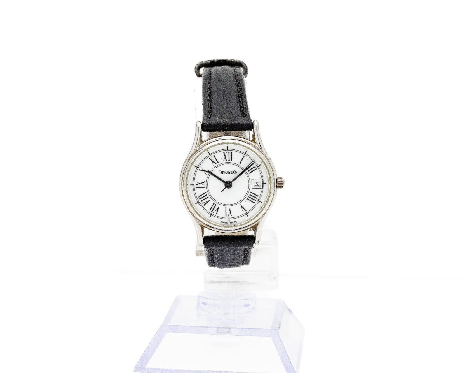 Stainless Steel Tiffany Co Quartz Wristwatch: Tiffany & Co. · Stainless Steel · Roman Dial · Quartz Movement · Vintage A refined embodiment of Tiffany's timeless elegance, this vintage wristwatch captures the brand's heritage of understated l
