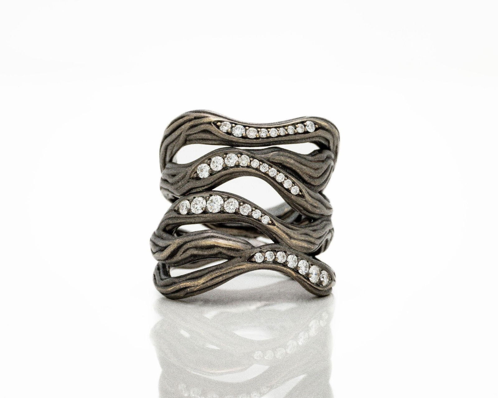 Antonini 18kt Black Gold Diamond Vulcano Ring: Antonini 18K Black Rhodium Gold Vulcano Ring - 0.50 ctw E/VVS Diamonds - Iconic Italian Design An exceptional designer creation from Antonini of Milan, this Vulcano ring exemplifies modern Italian lux