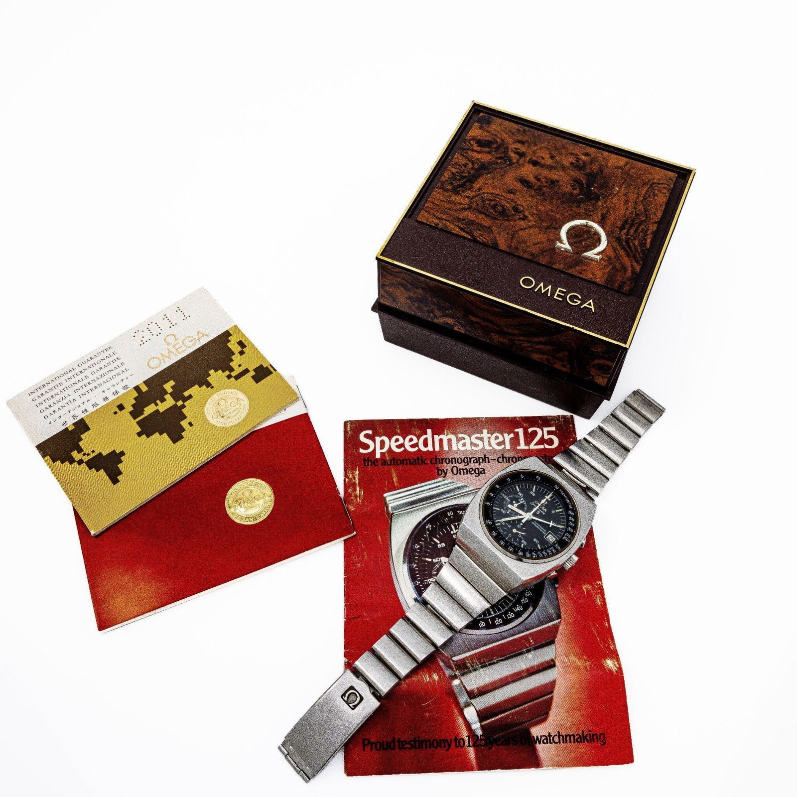 Omega Speedmaster 125 Chronograph Auto Full Set: Omega Speedmaster 125 Chronograph Automatic Full Set A historically significant and highly distinctive model from Omega; the Speedmaster 125 was introduced in 1973 to commemorate the brand's 125th