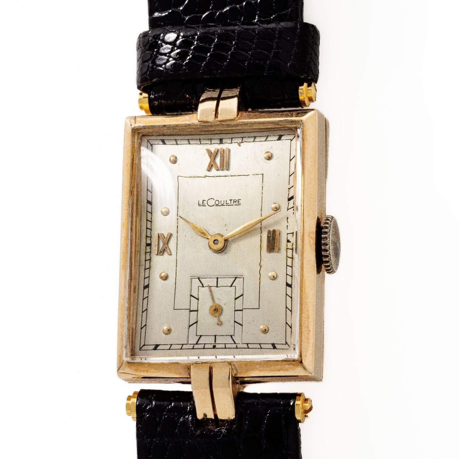 LeCoultre Rectangular 14k Gold Art Deco Wristwatch: LeCoultre Rectangular 14kt Gold Art Deco Wristwatch Circa 1940s-1950s This elegant LeCoultre rectangular wristwatch captures the essence of the Art Deco era; a time when design was defined by