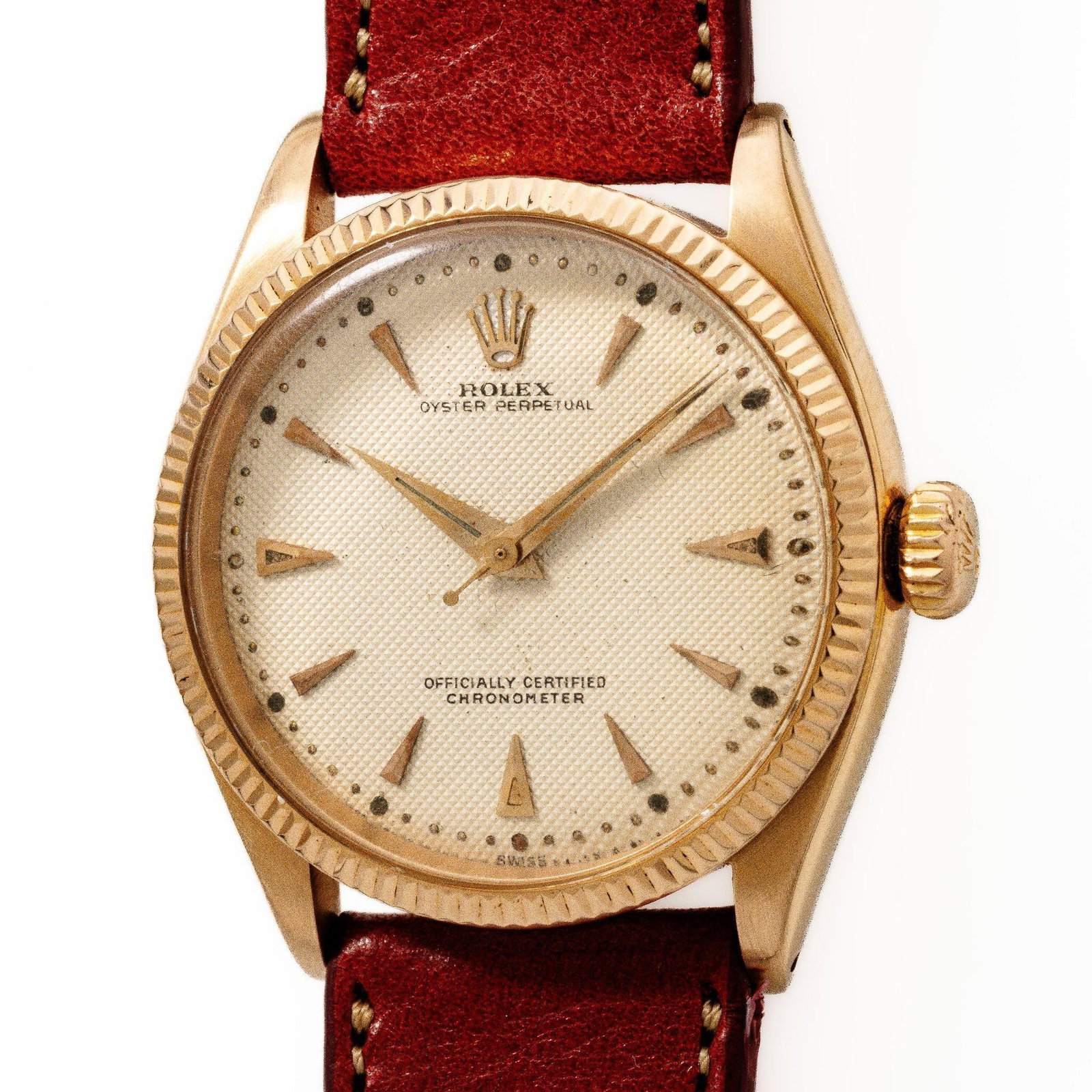 Vintage Rolex Oyster Perpetual 6285 18K Gold;: A striking example of mid-century Rolex craftsmanship; this Oyster Perpetual Ref. 6285 captures the essence of 1950s design with both texture and warmth. The standout feature is its beautifully
