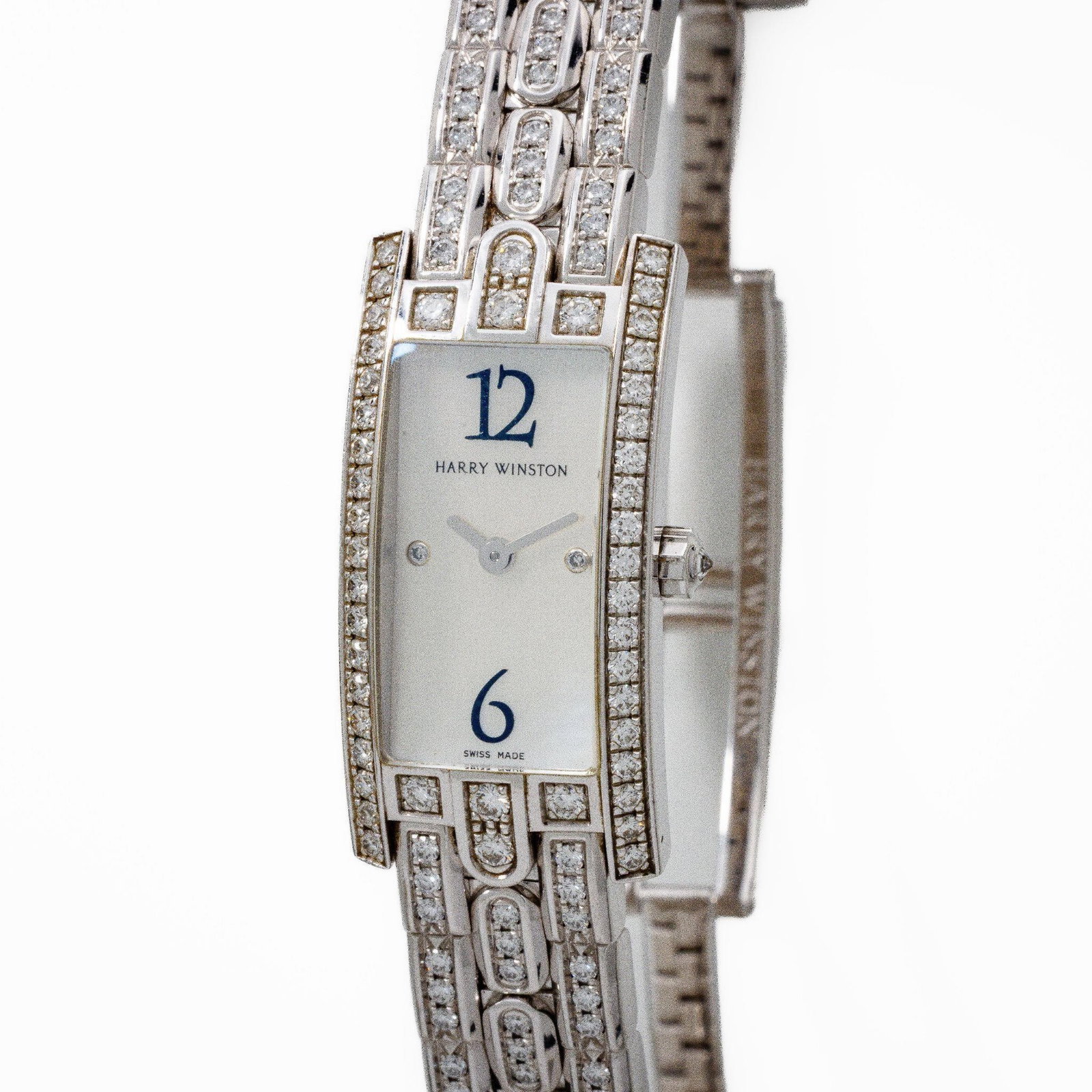 Harry Winston 18kt Avenue C 332LQW Diamond Watch: A refined and elegant example of Harry Winston's Avenue collection; this Lady's Avenue C wristwatch embodies the maison's signature blend of high jewelry and horology. Crafted in 18kt white gold and