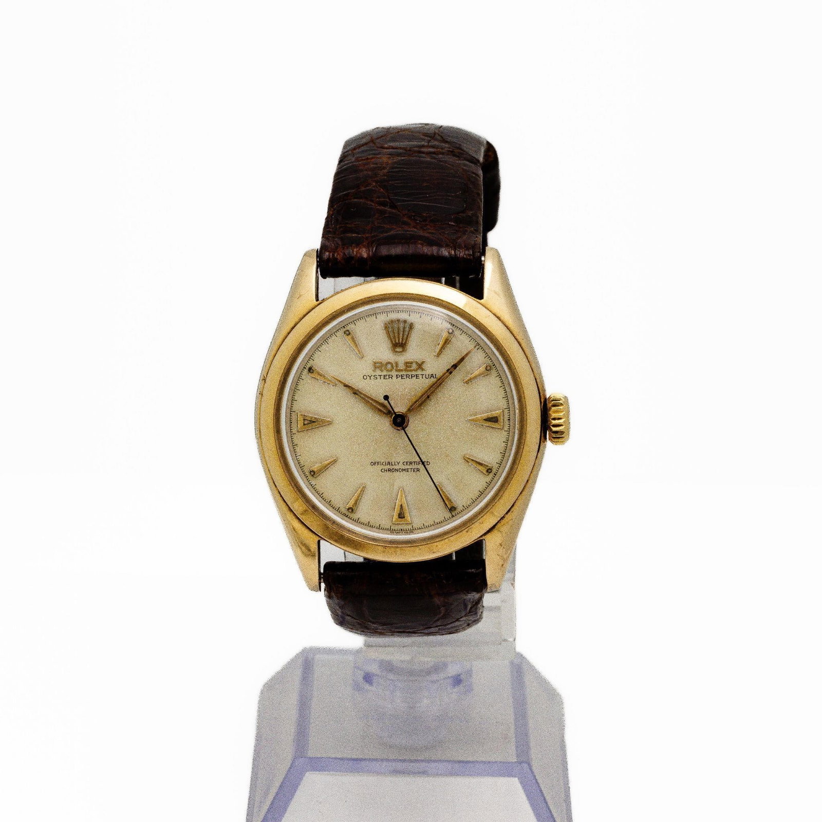 Vintage Rolex Ref 6084 Oyster Perpetual Gold Watch: A classic early example of Rolex's Oyster Perpetual line; this reference 6084 dates to the early 1950s and reflects the brand's transition into refined; chronometer-certified wristwatches built for ev