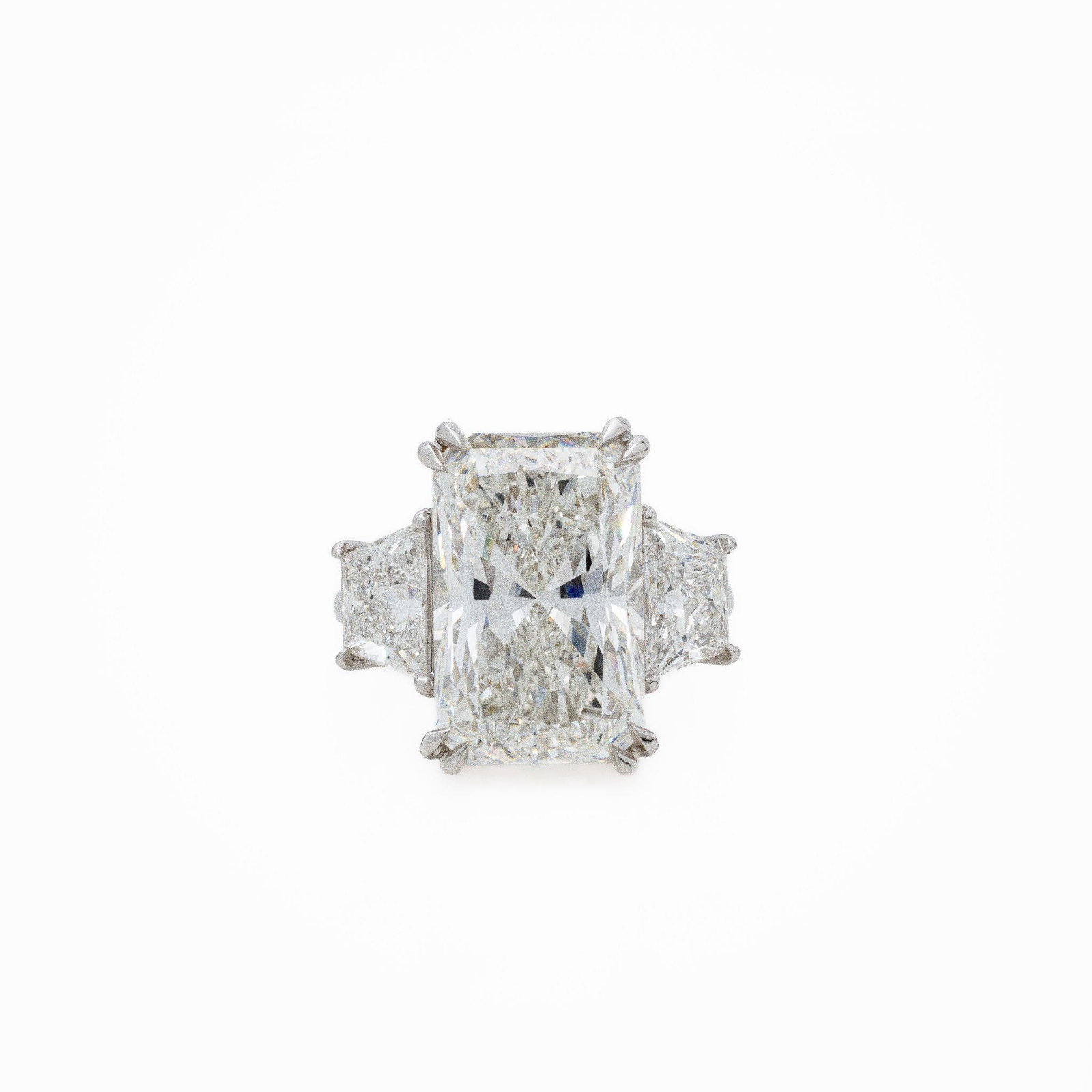18KT White Gold 11.90 ctw Three-Stone Diamond Ring: 18kt White Gold Three Stone Lab Diamond Ring · 10.60ct Radiant · 11.90 ctw A bold and luxurious three stone ring crafted in 18kt white gold and centered by an impressive 10.60 carat radiant cut lab