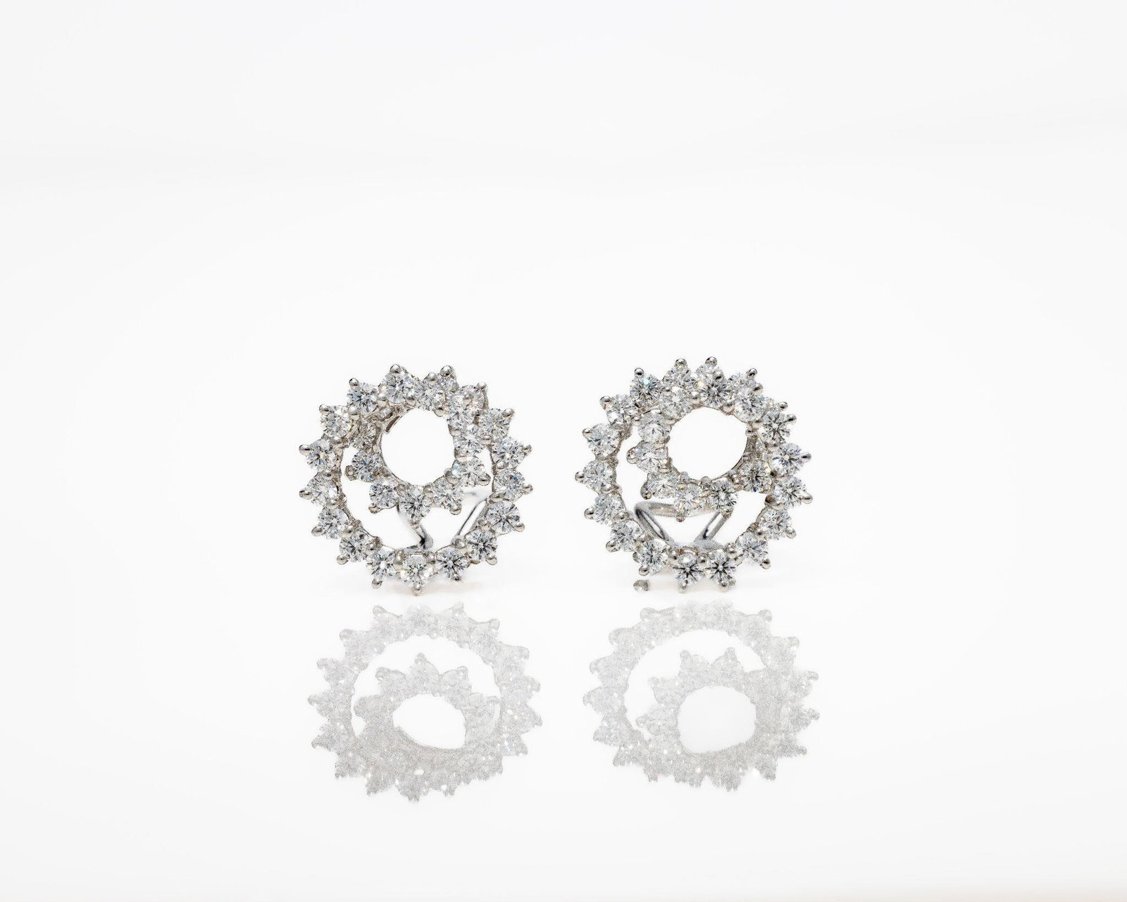 Tiffany & Co Platinum 3 ct Diamond Spiral Earrings: Tiffany & Co. Platinum PT950 Diamond Spiral Earrings · 3.00 ctw · Signed · Original Box A refined and highly recognizable pair of authentic Tiffany & Co. diamond spiral earrings; masterfully