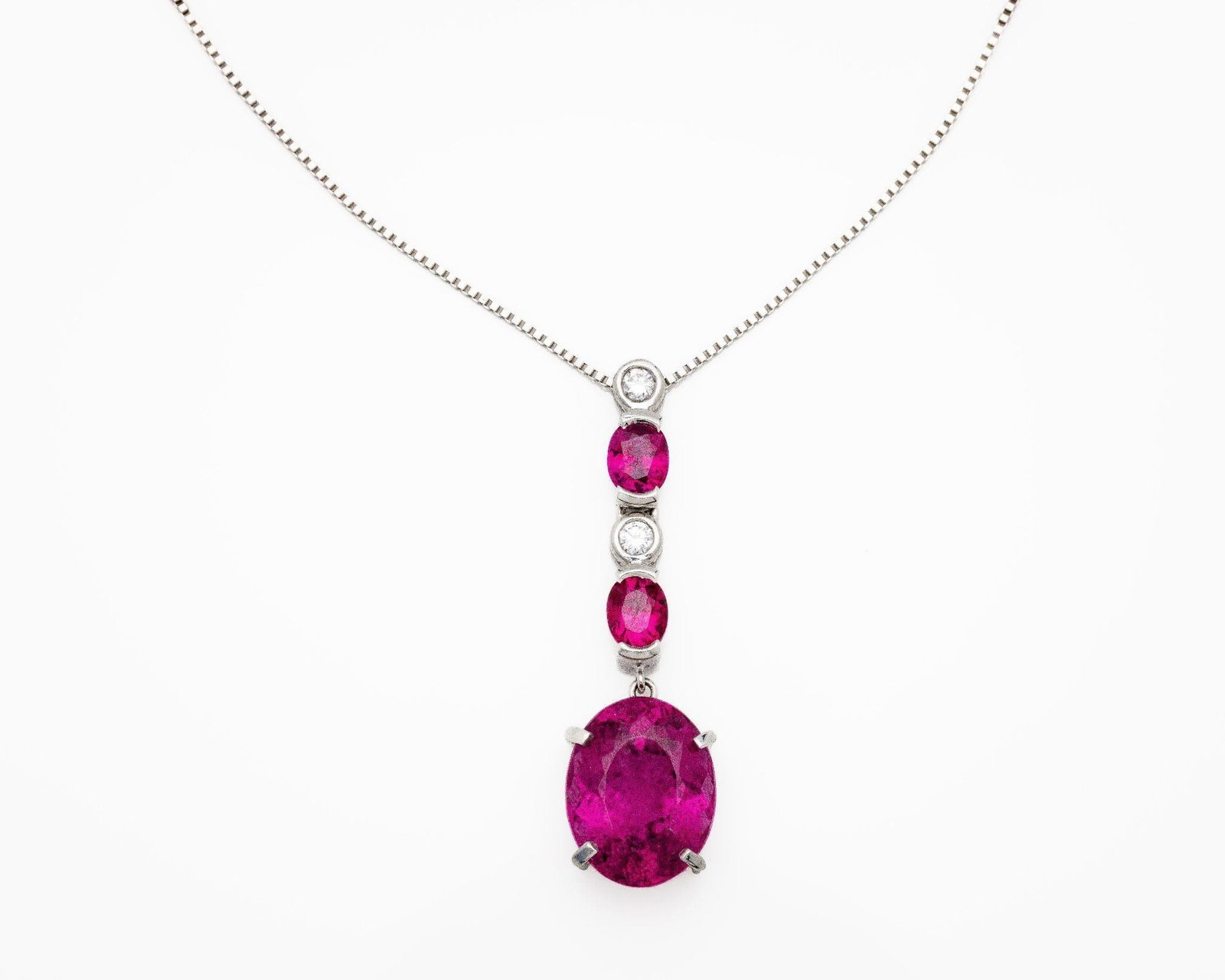 Platinum Natural Rubellite Diamond Chain Pendant: Exquisite Platinum Rubellite Tourmaline; Ruby; and Diamond Drop Necklace This exceptional high-end set; crafted entirely in solid platinum; showcases rare and luxurious gemstones in a unique and sophi