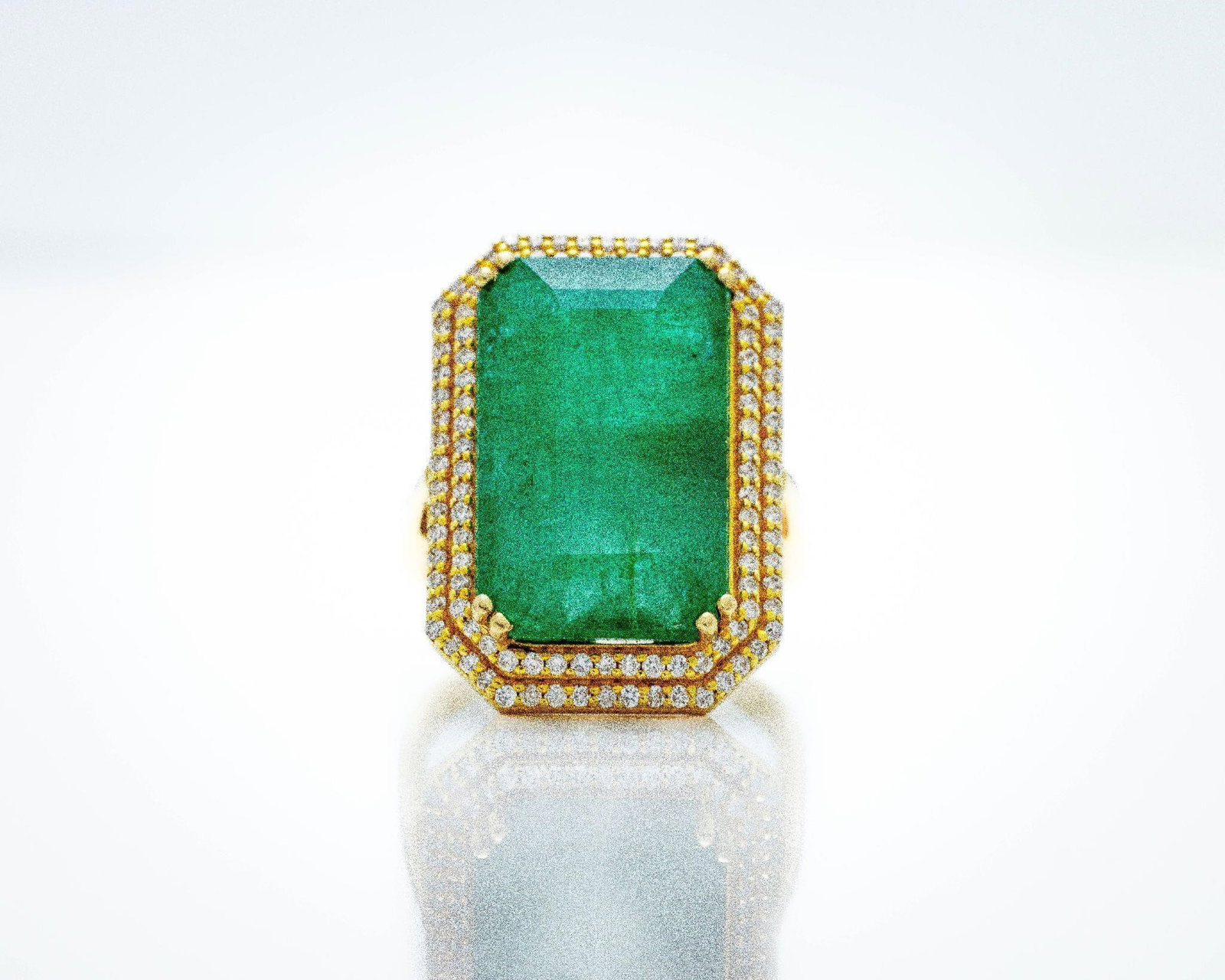 14kt 14.45ct Zambian Emerald Diamond Halo Ring: Very Fine 14kt Gold Zambian Emerald & Diamond Estate Ring - 14.45ct Radiant Cut - Halo Design This extraordinary estate ring features a showstopping 14.45-carat natural Zambian emerald in a vibrant ra