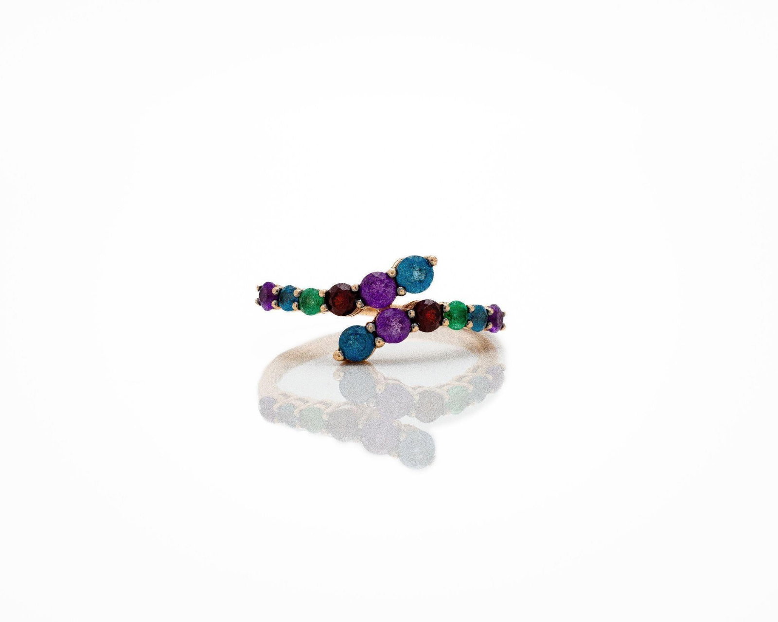 14k Rose Gold MultiColor Topaz LeVian Fashion Ring: Le Vian 14kt Rose Gold Multi-Color Topaz Ring A vibrant and elegantly composed fashion ring by Le Vian; showcasing a lively arrangement of twelve natural multi-colored topaz gemstones in graduating
