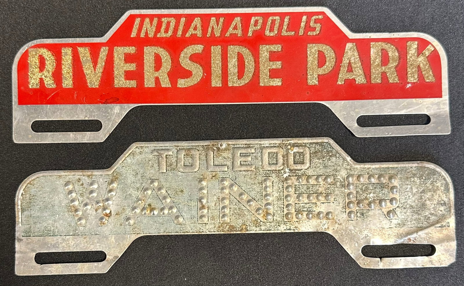 Pair 1920s-30s License Plate Toppers: Ford Punched Wainer Toledo Ohio & Indianapolis Riverside Park: Early pair of toppers. Minimal wear as shown.