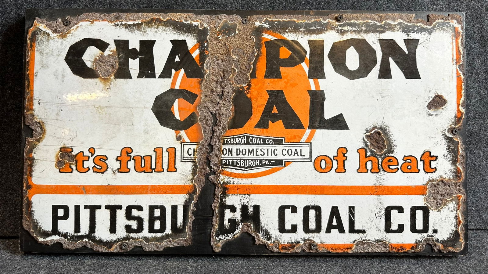 Champion Coal Single Sided Porcelain Pittsburgh PA Advertising Sign: 24" x 13" overall - mounted on board for display, obviously rusted through.