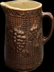 Antique Grape Cluster Embossed Stoneware Pitcher