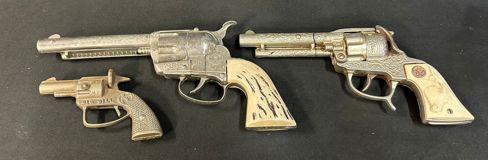 Lot 3 Original Cowboy Western Cap Guns Mattel Fanner 50 Hubley Texan & Big Bill: Largest 10.75" x 1.25" x 5.25" Smallest 5" x .75" x 3.25"