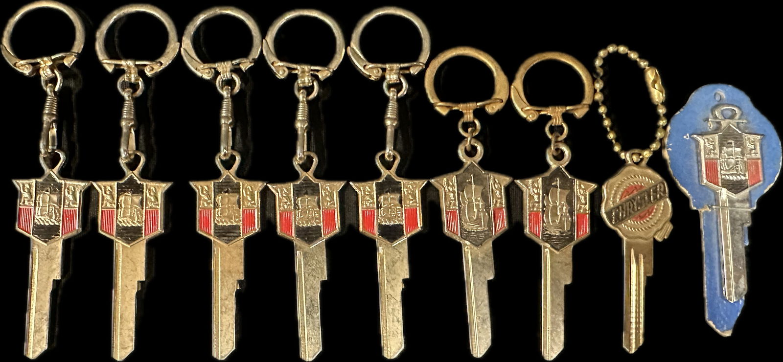 Lot 9 1950s Chrysler & Plymouth NOS Uncut Auto Embossed Car Keys w/ Chains (1 of 15)