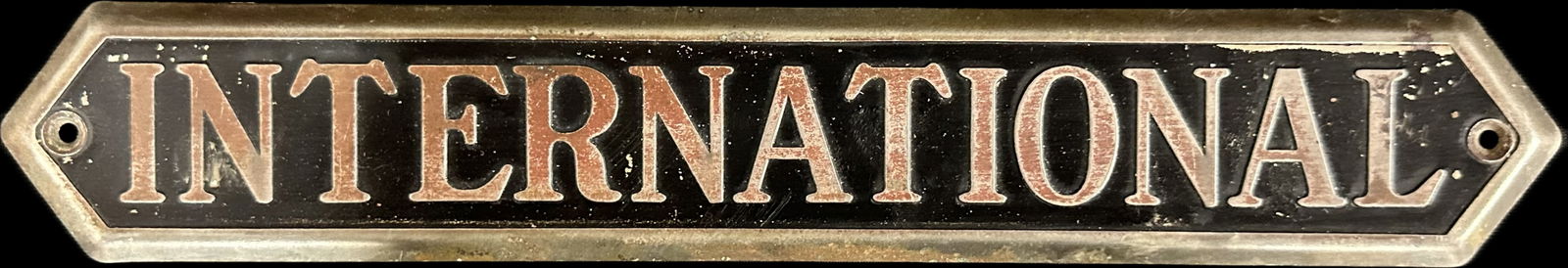 International Truck Original 1920s Brass Embossed Painted Black Advertising Sign #1 (1 of 5)
