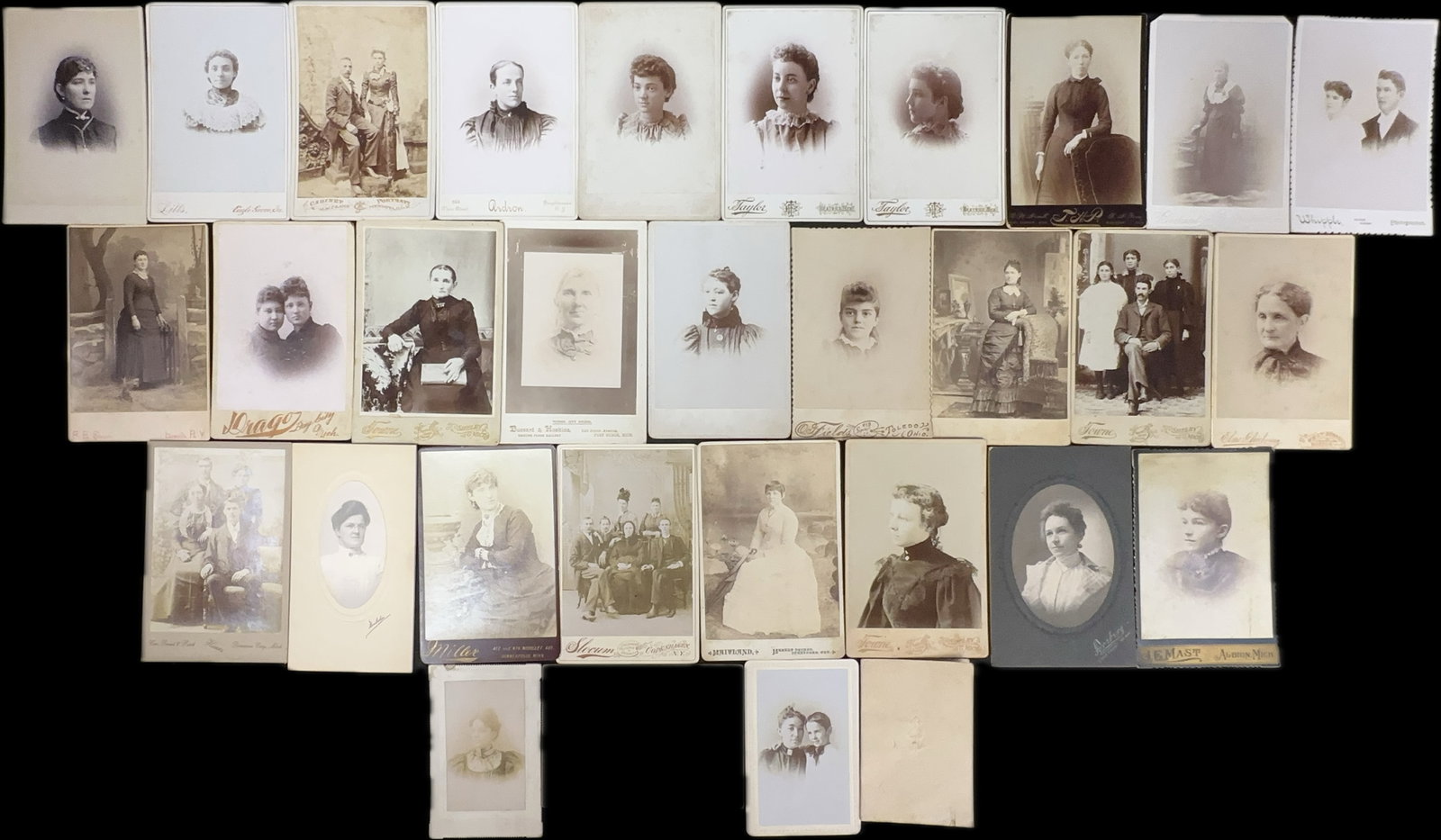 Lot 31 Victorian Era Cabinet Card Photographs All Featuring Women: This lot consists of 31 original cabinet card photographs in varying sizes and by various makers throughout the US. All photos depict women of all sorts of varying ages. Great condition lot. Most meas