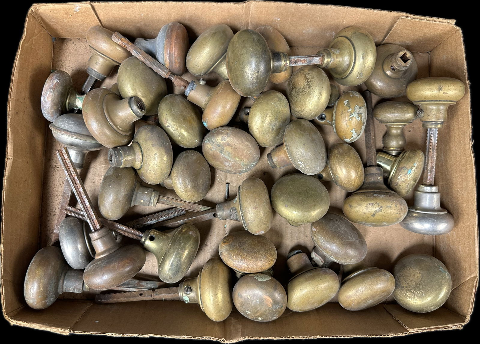 Huge Lot of 39 Late 1800s Brass Door Knobs: This lot contains 39 total knobs, 2 are connected as pairs. Sizes and condition varies. Sizes range from 1.5" - 2" diameter.