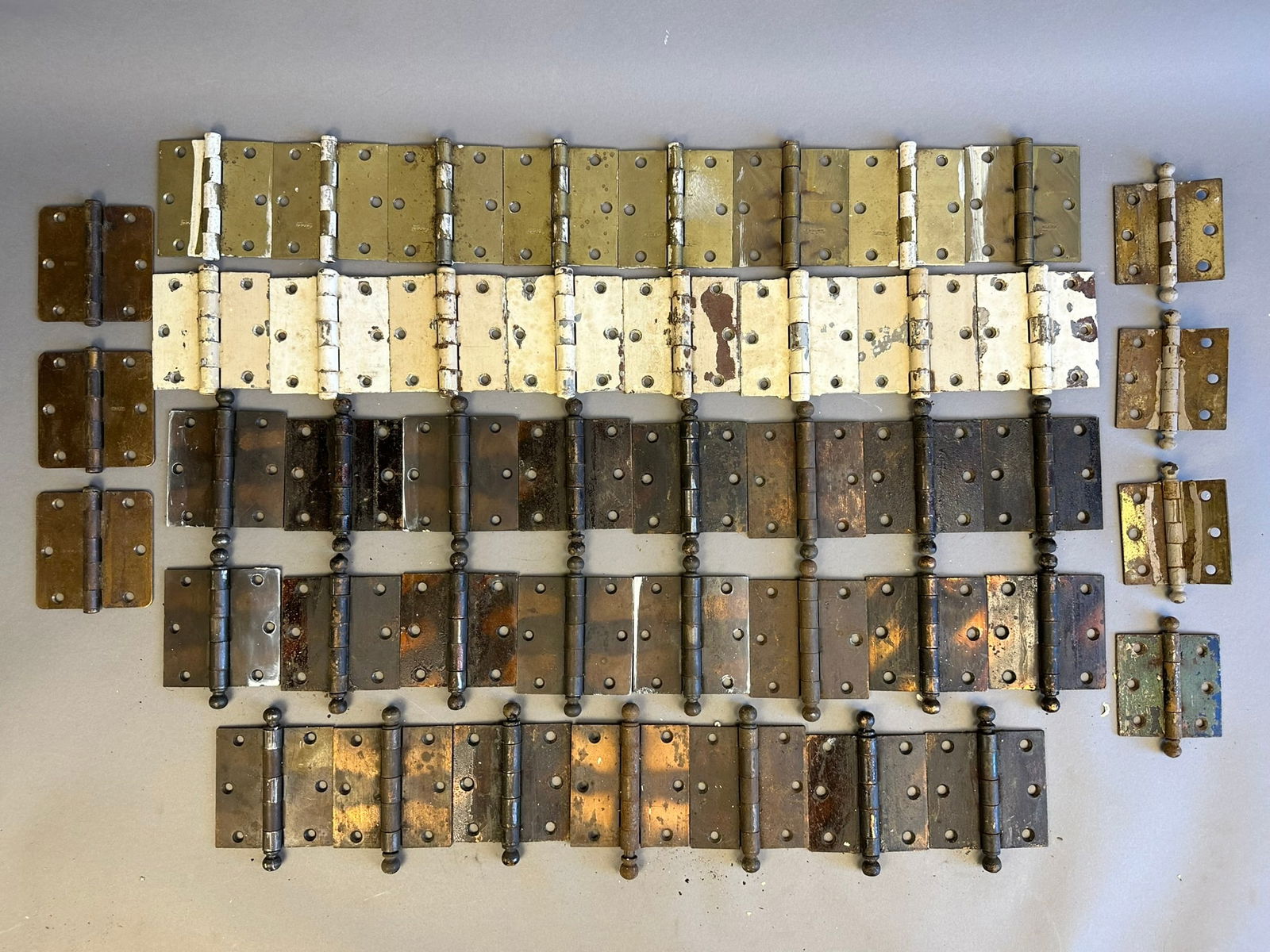 Huge Lot 46 Antique Brass Door Hinges: This lot consists of 46 door hinges. Each one measures 3.5"x3.5". Condition may vary, and some have been painted previously.