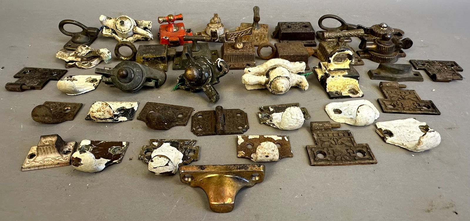 Lot of 19 Eastlake Victorian Window Latch Lock Assemblies Ornately Decorated Brass: Fantastic lot of 19 window lock or latch assemblies. Many great brass ornate eastlake pieces in this lot. Condition and size may vary per piece. Most pieces are around 1.25"x2.75"x2".
