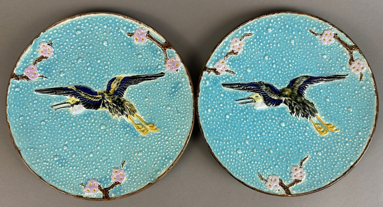 2 Piece Lot Holdcroft Majolica Bird & Blossom Plates: Beautiful lot of 2 Holdcroft Majolica Bird & Blossom Pattern Plates. Both plates are marked by the maker. Overall measurements are 8.5" diameter.