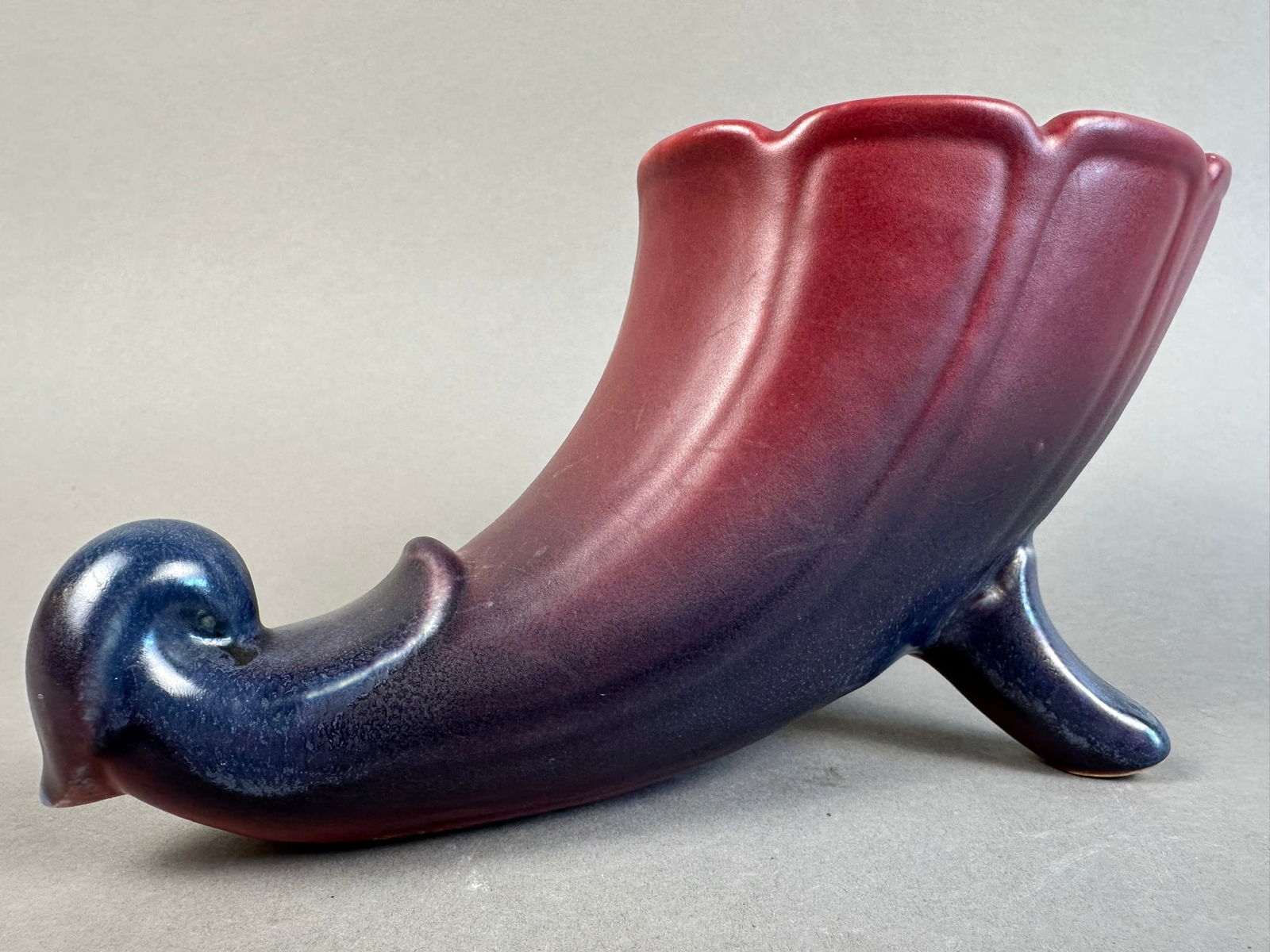 Weller Pottery Loru Mulberry Footed Cornucopia Planter: Beautiful signed Weller pottery piece. Overall measurements are 8"x4"x4".