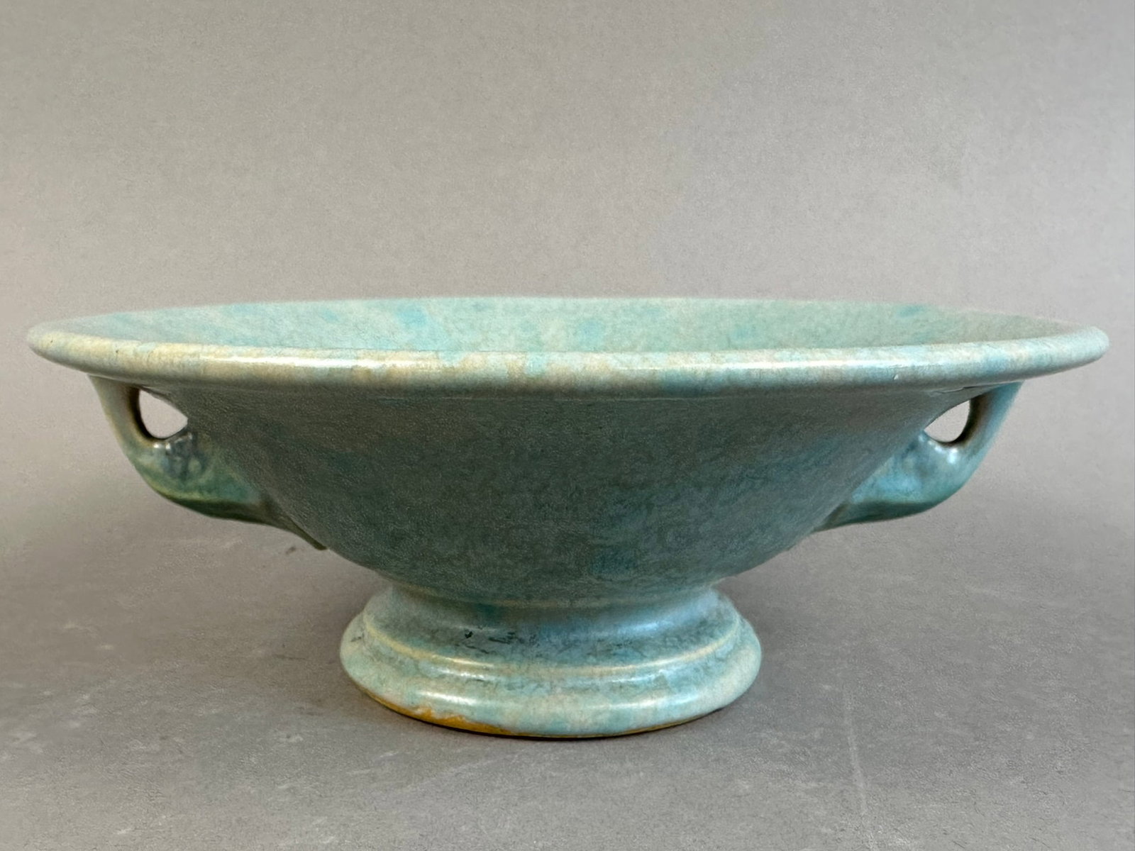 Roseville Pottery Tuscany Pedestal Bowl 2 Handled: Beautiful unsigned Roseville Pottery pedestal bowl with 2 handles. Overall condition is excellent. Overall measurements 7" diameter and 2.75" tall.