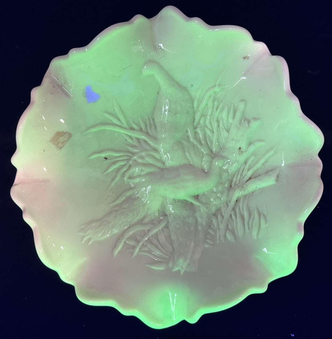 Northwood Peacocks Custard Uranium Glass Bowl: This lot consists of a beautiful signed Northwood bowl, with Peacocks on the Fence pattern. This one lit up when put under a black light. Bowl is in excellent condition.