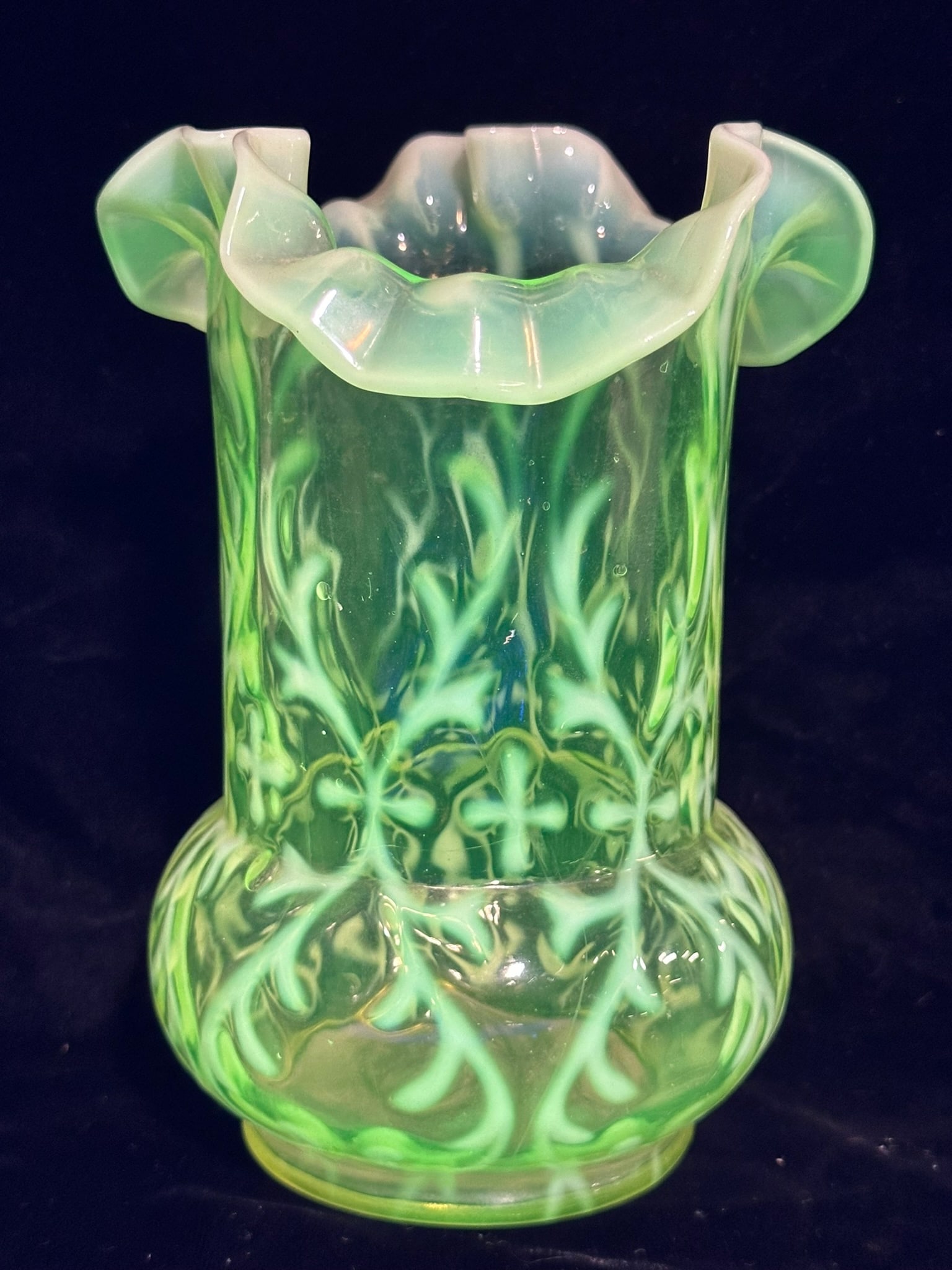 Northwood Uranium Opalescent Spanish Lace Vase: This lot features a beautiful Northwood uranium glass with opalescent spanish lace pattern. The vase is in excellent condition.